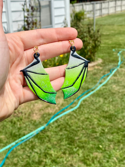 Enchanted Flight – Silver & Green Bat Wing Dangle Earrings