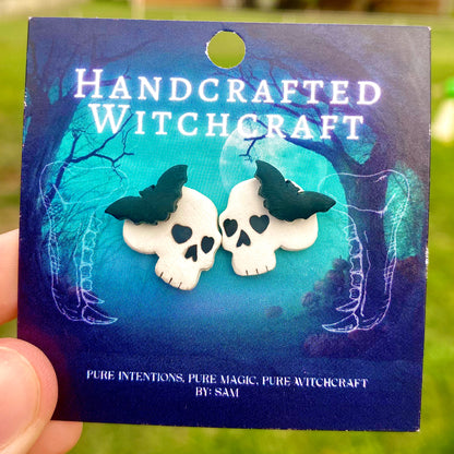 Nocturne Remains – Bat-Topped Skull Stud Earrings